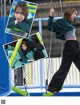 A young woman is swinging on a swing set.