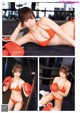 A woman in a bikini and boxing gloves posing for a picture.